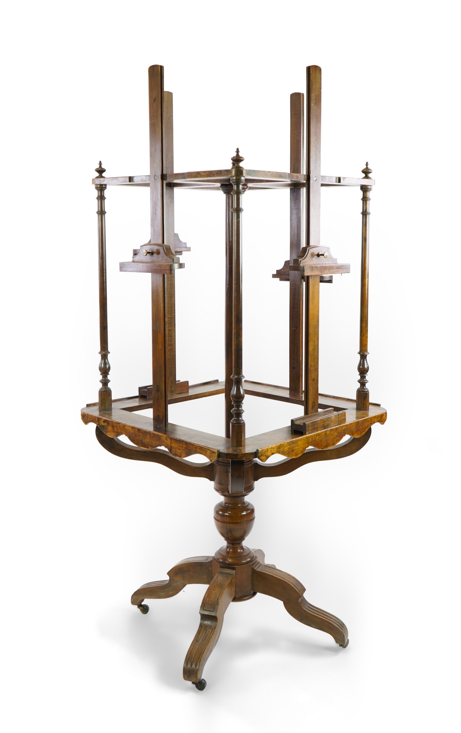 A 19th century French salon beech four way revolving easel